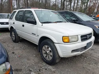 1998 Honda Passport LX with VIN 4S6CM58W5W4411132, listed as a IAAI auction lot 41381629 with 254,488 mi miles. Bid and sale history available at carsss.com. Image 1.