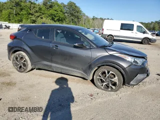 2018 Toyota C-HR XLE with VIN NMTKHMBX9JR058852, listed as a Copart auction lot 52934725 with 84,002 mi miles and Salvage title. Bid and sale history available at DreamBid. Image 4.