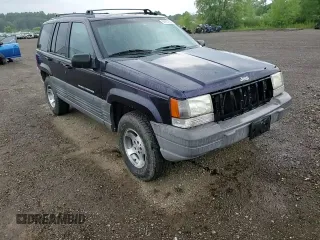 1998 Jeep Grand Cherokee Laredo with VIN 1J4GZ58SXWC144437, listed as a Copart auction lot 60437094 with 183,908 mi miles and Salvage Title. Bid and sale history available at carsss.com. Image 11.