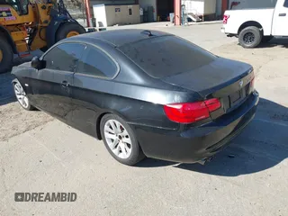 2012 BMW 3 Series 328i with VIN WBAKE5C54CE756031, listed as a IAAI auction lot 41667753 with 100,415 mi miles and . Bid and sale history available at carsss.com. Image 3.