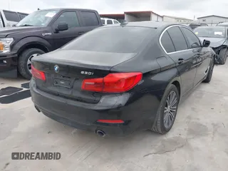 2019 BMW 5 Series 530i with VIN WBAJA5C50KWW38431, listed as a IAAI auction lot 41483263 with 94,436 mi miles. Bid and sale history available at carsss.com. Image 4.