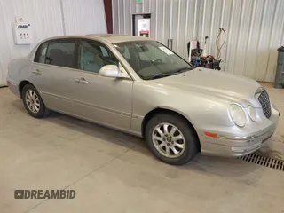 2005 Kia Amanti z VIN KNALD124155065454, wystawiony jako IAAI lot #42482826 z przebiegiem 163 835 mil mil oraz . Historia ofert i sprzedaży dostępna na DreamBid. Obrazek 1.