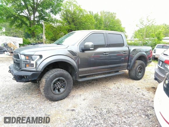 2017 Ford F-150 Raptor with VIN 1FTFW1RG8HFA31164, listed as a IAAI auction lot 42125542 with 164,745 mi miles and . Bid and sale history available at carsss.com. Image 14.