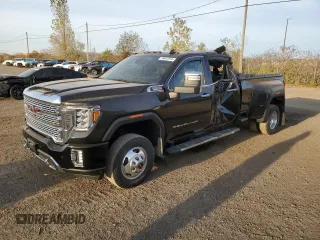 2021 GMC Sierra 3500HD Denali z VIN 1GT49WEY6MF121952, wystawiony jako Copart lot #78447514 z przebiegiem Nie podano mil oraz Szkoda całkowita • Salvage title. Historia ofert i sprzedaży dostępna na DreamBid. Obrazek 1.