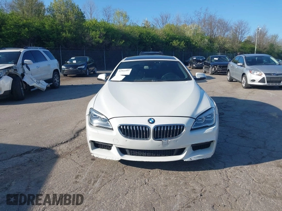 2016 BMW 6 Series 640i xDrive with VIN WBA6D2C51GGT66209, listed as a IAAI auction lot 42064405 with 113,500 mi miles and . Bid and sale history available at carsss.com. Image 13.