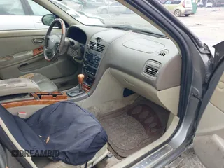 2004 Infiniti I35 with VIN JNKDA31AX4T212950, listed as a IAAI auction lot 41390493 with 123,198 mi miles. Bid and sale history available at carsss.com. Image 5.