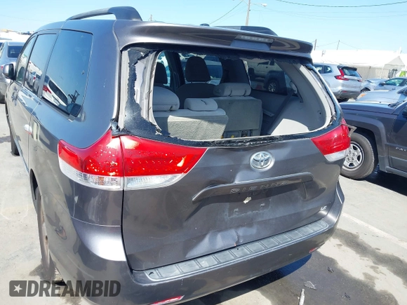 2012 Toyota Sienna LE AAS with VIN 5TDKK3DC9CS184722, listed as a IAAI auction lot 41942991 with 227,783 mi miles. Bid and sale history available at carsss.com. Image 6.