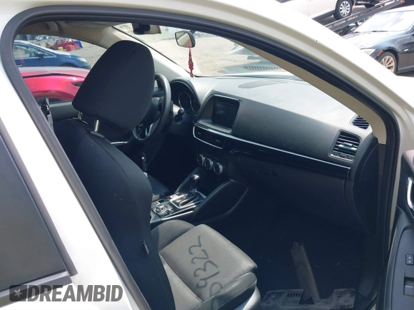 2016 Mazda CX-5 Sport with VIN JM3KE2BY6G0641051, listed as a IAAI auction lot 39959322 with 118,453 mi miles. Bid and sale history available at carsss.com. Image 5.