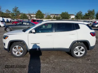 2020 Jeep Compass Latitude with VIN 3C4NJDBB2LT115599, listed as a IAAI auction lot 40970548 with 63,349 mi miles. Bid and sale history available at carsss.com. Image 14.