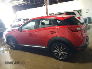 2017 Mazda CX-3 Grand Touring z VIN JM1DKFD70H0148182, wystawiony jako Copart lot #59032435 z przebiegiem 70 166 mil mil oraz Szkoda całkowita • Salvage title. Historia ofert i sprzedaży dostępna na DreamBid. Obrazek 2.