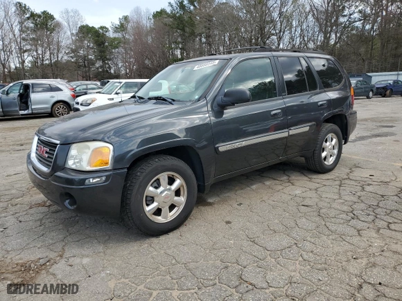 2003 GMC Envoy SLT with VIN 1GKDS13S332326838, listed as a Copart auction lot 48888545 with 197,969 mi miles and Clean Title. Bid and sale history available at carsss.com. Image 1.