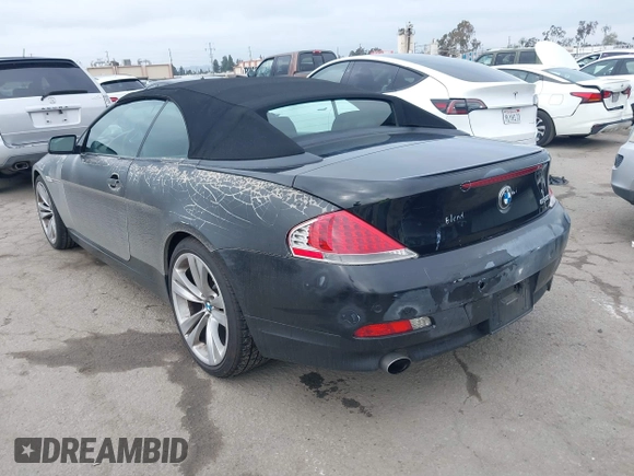 2007 BMW 6 Series 650i with VIN WBAEK13507CN81020, listed as a IAAI auction lot 42167743 with 127,552 mi miles. Bid and sale history available at carsss.com. Image 3.