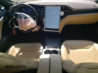 2016 Tesla Model S 90D with VIN 5YJSA1E42GF139758, listed as a Copart auction lot 63077255 with 78,235 mi miles and Salvage title. Bid and sale history available at DreamBid. Image 8.