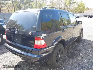 2003 Mercedes-Benz M-Class 3.7L with VIN 4JGAB57E03A418713, listed as a IAAI auction lot 41835875 with 195,982 mi miles. Bid and sale history available at carsss.com. Image 4.