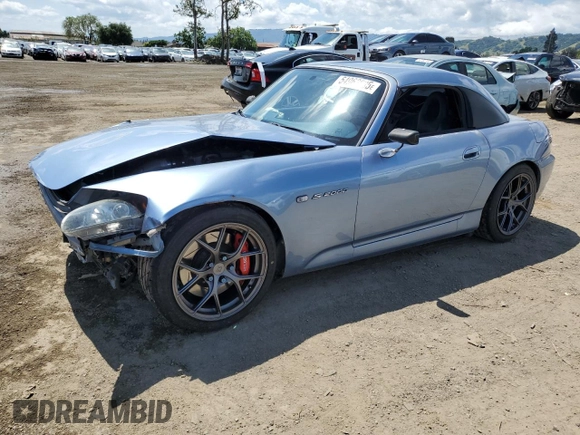 2004 Honda S2000 z VIN JHMAP21454T002150, wystawiony jako Copart lot #54963835 z przebiegiem 143 220 mil mil oraz Szkoda całkowita • Salvage title. Historia ofert i sprzedaży dostępna na DreamBid. Obrazek 1.