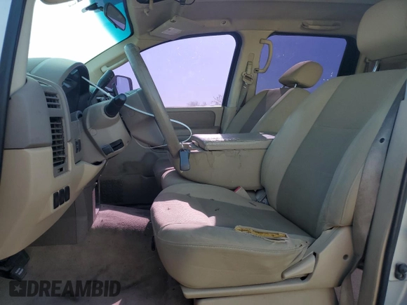 2008 Nissan Titan XE with VIN 1N6AA07D38N301724, listed as a Copart auction lot 58426715 with 211,005 mi miles and Salvage title. Bid and sale history available at DreamBid. Image 7.