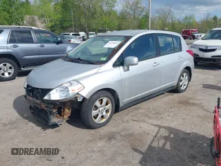 2009 Nissan Versa S with VIN 3N1BC13EX9L413558, listed as a IAAI auction lot 42198891 with 158,311 mi miles and . Bid and sale history available at DreamBid. Image 2.