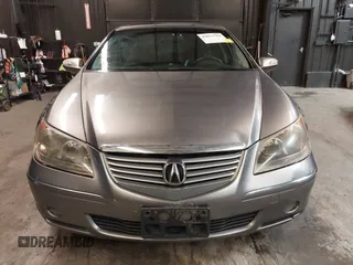 2006 Acura RL z VIN JH4KB165X6C009547, wystawiony jako IAAI lot #42073784 z przebiegiem 190 601 mil mil oraz . Historia ofert i sprzedaży dostępna na DreamBid. Obrazek 6.