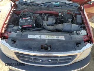 2000 Ford F-150 XL with VIN 1FTZX1728YNA87502, listed as a Copart auction lot 54870295 with 219,971 mi miles and Salvage title. Bid and sale history available at DreamBid. Image 11.