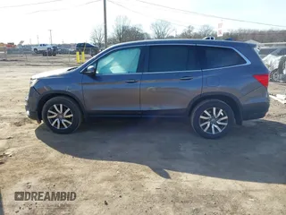 2020 Honda Pilot EX-L с VIN 5FNYF6H52LB039456, выставлен на аукционе IAAI как лот 41831333 с пробегом 118 337 миль миль и . История ставок и продаж доступна на DreamBid. Изображение 14.
