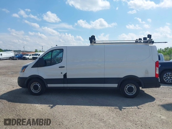 2021 Ford Transit Cargo with VIN 1FTYE1Y80MKA75151, listed as a IAAI auction lot 42577609 with 91,623 mi miles and . Bid and sale history available at DreamBid. Image 14.