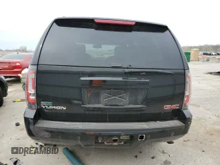 2009 GMC Yukon SLT 4SB with VIN 1GKFK33009R280856, listed as a Copart auction lot 51522635 with 265,941 mi miles and Salvage Title. Bid and sale history available at DreamBid. Image 6.