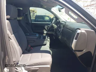2018 Chevrolet Silverado 1500 LT with VIN 3GCUKREC1JG511846, listed as a IAAI auction lot 42024170 with 121,532 mi miles and . Bid and sale history available at DreamBid. Image 5.