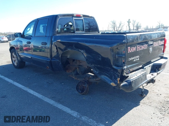 2007 Dodge Dakota SLT z VIN 1D7HW48JX7S196121, wystawiony jako IAAI lot #41863734 z przebiegiem 148 720 mil mil oraz . Historia ofert i sprzedaży dostępna na DreamBid. Obrazek 3.