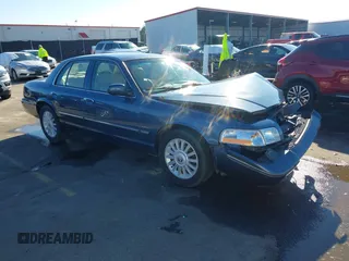 2010 Mercury Grand Marquis LS z VIN 2MEBM7FV8AX601666, wystawiony jako IAAI lot #41580800 z przebiegiem 94 030 mil mil oraz . Historia ofert i sprzedaży dostępna na DreamBid. Obrazek 1.