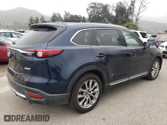2017 Mazda CX-9 Grand Touring z VIN JM3TCADY3H0140573, wystawiony jako Copart lot #60513145 z przebiegiem 97 793 mil mil oraz Czysty tytuł • Clean title. Historia ofert i sprzedaży dostępna na DreamBid. Obrazek 3.