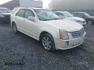 2007 Cadillac SRX z VIN 1GYEE637770192394, wystawiony jako IAAI lot #42253431 z przebiegiem 263 739 mil mil oraz . Historia ofert i sprzedaży dostępna na DreamBid. Obrazek 1.