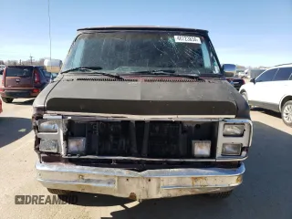 1989 Chevrolet Chevy Van z VIN 1GBEG25K4K7168245, wystawiony jako Copart lot #60162924 z przebiegiem 22 708 mil mil oraz Szkody całkowita. Historia ofert i sprzedaży dostępna na DreamBid. Obrazek 5.