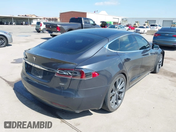 2017 Tesla Model S 100D with VIN 5YJSA1E29HF204881, listed as a IAAI auction lot 41785767 with 146,523 mi miles and . Bid and sale history available at DreamBid. Image 4.