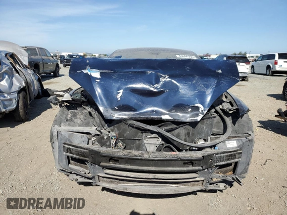 2014 Tesla Model S 60 with VIN 5YJSA1H13EFP38425, listed as a Copart auction lot 63686205 with 183,968 mi miles and Salvage title. Bid and sale history available at DreamBid. Image 5.