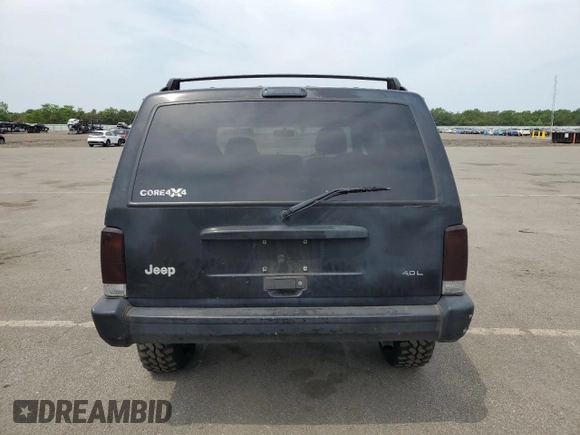 1999 Jeep Cherokee Sport with VIN 1J4FF68S9XL635836, listed as a Copart auction lot 59573195 with 187,035 mi miles and Salvage title. Bid and sale history available at DreamBid. Image 6.