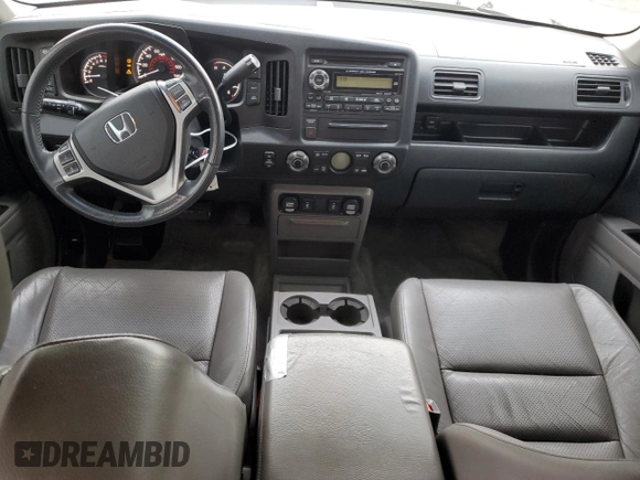 2010 Honda Ridgeline RTL with VIN 5FPYK1F58AB005088, listed as a Copart auction lot 47477975 with 128,538 mi miles and Salvage Title. Bid and sale history available at carsss.com. Image 8.