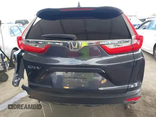 2019 Honda CR-V EX with VIN 5J6RW1H53KA031097, listed as a IAAI auction lot 42009187 with 115,701 mi miles. Bid and sale history available at carsss.com. Image 17.