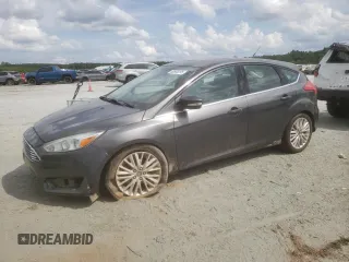 2016 Ford Focus Titanium z VIN 1FADP3N22GL259774, wystawiony jako Copart lot #60868295 z przebiegiem 167 322 mil mil oraz Szkoda całkowita • Salvage title. Historia ofert i sprzedaży dostępna na DreamBid. Obrazek 1.