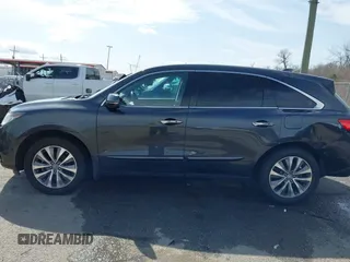 2014 Acura MDX Technology z VIN 5FRYD3H47EB007857, wystawiony jako IAAI lot #41732458 z przebiegiem 173 435 mil mil oraz . Historia ofert i sprzedaży dostępna na DreamBid. Obrazek 14.