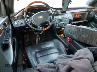 2003 Cadillac DeVille DTS z VIN 1G6KF57963U245281, wystawiony jako Copart lot #79911554 z przebiegiem Nie podano mil oraz Szkody całkowita. Historia ofert i sprzedaży dostępna na DreamBid. Obrazek 8.