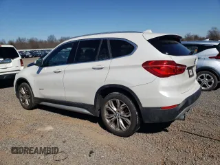2017 BMW X1 xDrive28i with VIN WBXHT3C31H5F82700, listed as a Copart auction lot 48051095 with 76,861 mi miles and Salvage Title. Bid and sale history available at carsss.com. Image 2.