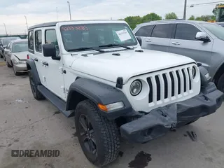 2018 Jeep Wrangler Unlimited Sport S with VIN 1C4HJXDG6JW222637, listed as a IAAI auction lot 42333283 with 80,595 mi miles and . Bid and sale history available at DreamBid. Image 1.