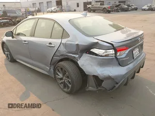 2023 Toyota Corolla Hybrid LE with VIN JTDBCMFE6P3002578, listed as a IAAI auction lot 41275201 with 34,263 mi miles. Bid and sale history available at carsss.com. Image 3.