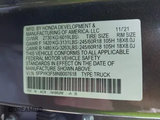 2022 Honda Ridgeline RTL with VIN 5FPYK3F58NB007618, listed as a IAAI auction lot 42258443 with 14,036 mi miles and . Bid and sale history available at DreamBid. Image 9.