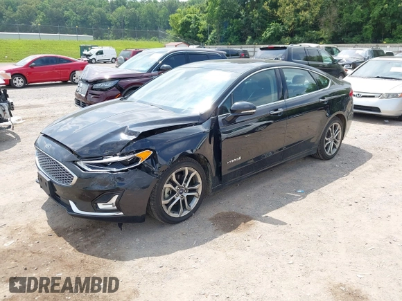 2019 Ford Fusion Titanium z VIN 3FA6P0RU0KR260239, wystawiony jako IAAI lot #42436643 z przebiegiem 114 631 mil mil oraz . Historia ofert i sprzedaży dostępna na DreamBid. Obrazek 17.