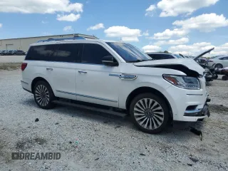 2019 Lincoln Navigator Reserve z VIN 5LMJJ2LT9KEL19544, wystawiony jako Copart lot #52240315 z przebiegiem 74 144 mil mil oraz Szkody całkowita. Historia ofert i sprzedaży dostępna na DreamBid. Obrazek 4.