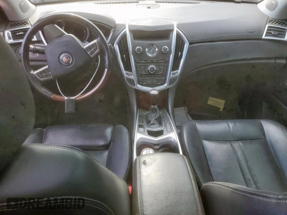 2012 Cadillac SRX Performance Collection z VIN 3GYFNBE31CS516837, wystawiony jako Copart lot #58346225 z przebiegiem 142 559 mil mil oraz Szkoda całkowita • Salvage title. Historia ofert i sprzedaży dostępna na DreamBid. Obrazek 8.