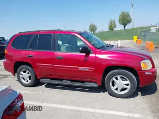 2005 GMC Envoy SLT with VIN 1GKDS13SX52144959, listed as a IAAI auction lot 41968495 with 238,199 mi miles. Bid and sale history available at carsss.com. Image 13.