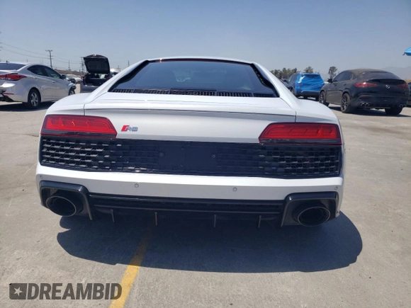2023 Audi R8 performance quattro z VIN WUACEAFX9P7900103, wystawiony jako Copart lot #57456835 z przebiegiem 5 220 mil mil oraz Szkoda całkowita • Salvage title. Historia ofert i sprzedaży dostępna na DreamBid. Obrazek 6.