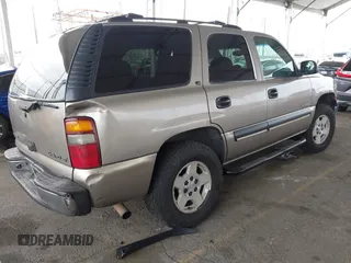 2002 Chevrolet Tahoe LS with VIN 1GNEC13T62R311933, listed as a IAAI auction lot 41895509 with 236,603 mi miles and . Bid and sale history available at DreamBid. Image 4.